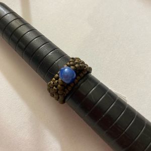 Brown Beaded Ring with Blue Center